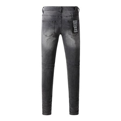 Urban Gray Ripped Jeans with Bold Black Graffiti Accents 3003