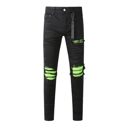 Vaqueros pitillo negros rotos 8880 con parches verdes para un look atrevido 