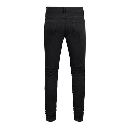 Jean slim noir pour homme avec patchwork, détails froissés et design déchiré 