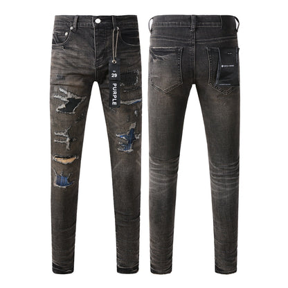 Pantalon en denim noir chic et vieilli 9080 combinant déchirures et patchs pour un style moderne 