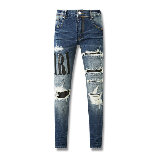 Purple Brand Gray Distressed Jeans with Faux Leather Patches and Lettering for a Vintage Look