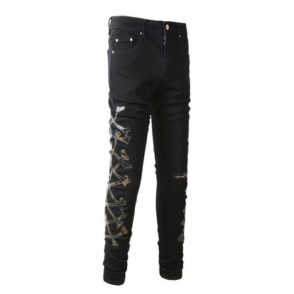 Jeans ajustados con estampado de camuflaje y empalmes rotos de cuero n.° 842 