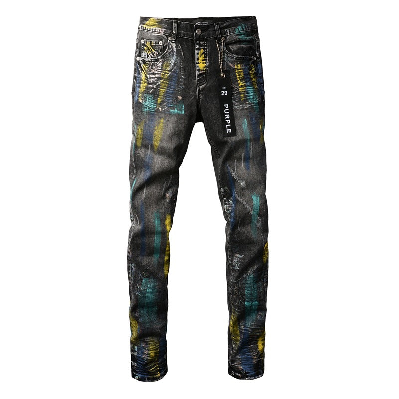 Fashionable Black Jeans with Bold Colorful Paint and Graffiti Detailing